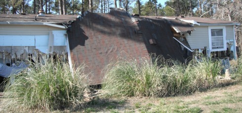Storm roof collapse and house damage